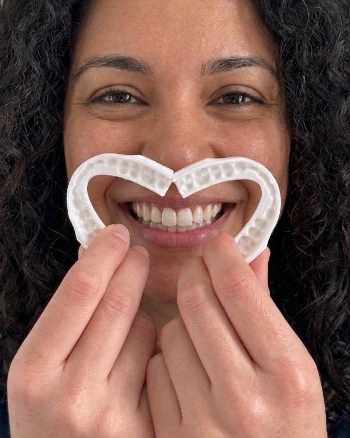 Woman holding the Jawvana clear night guard